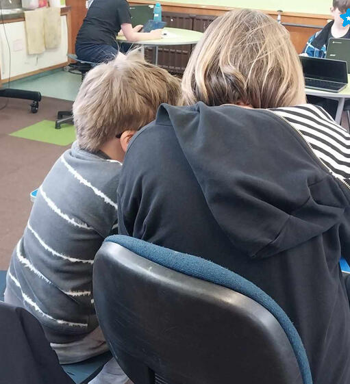 Son teaching his Mum Minecraft :)